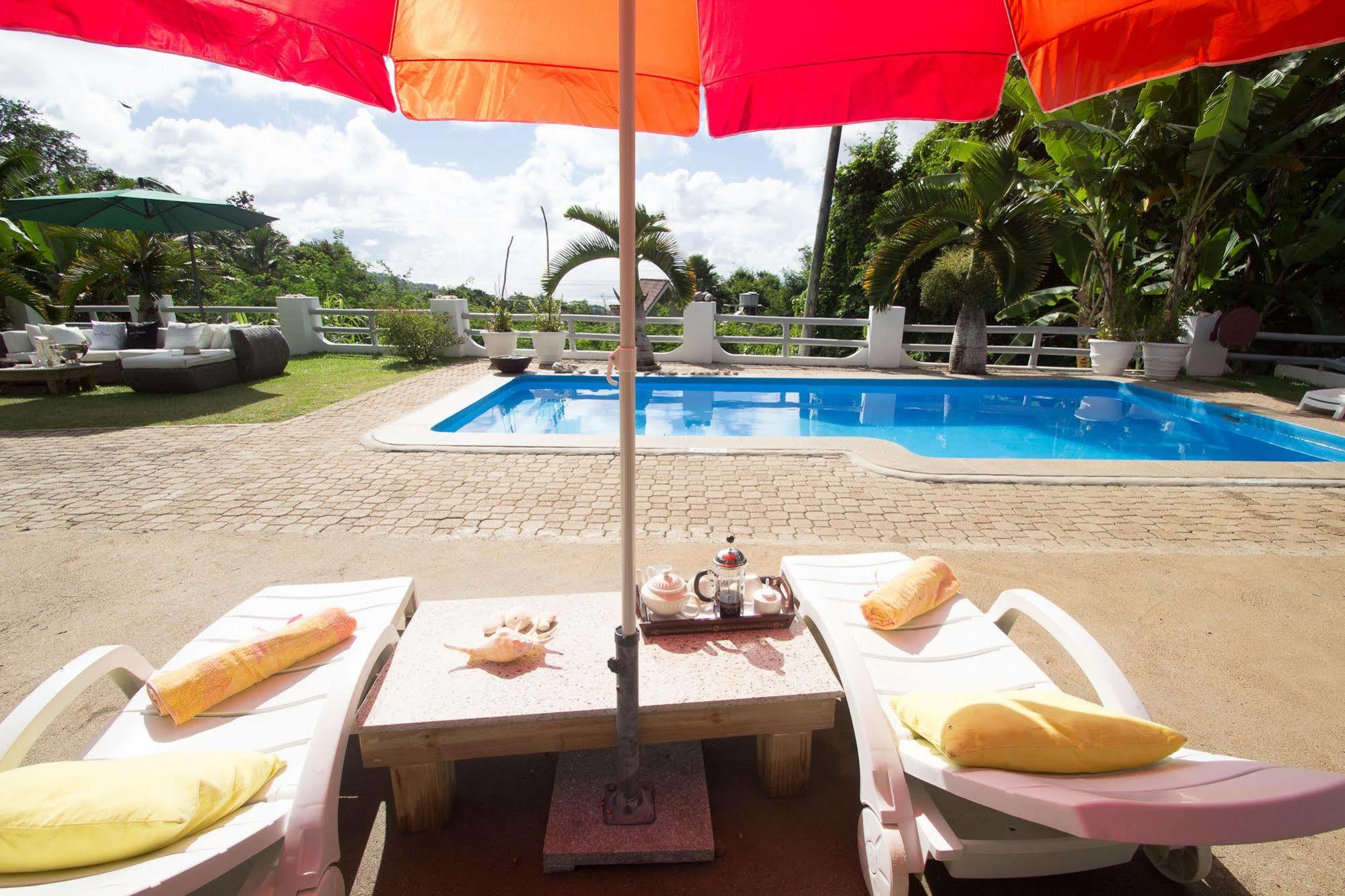 Kokogrove Chalets Hotel Anse Royale Exterior photo